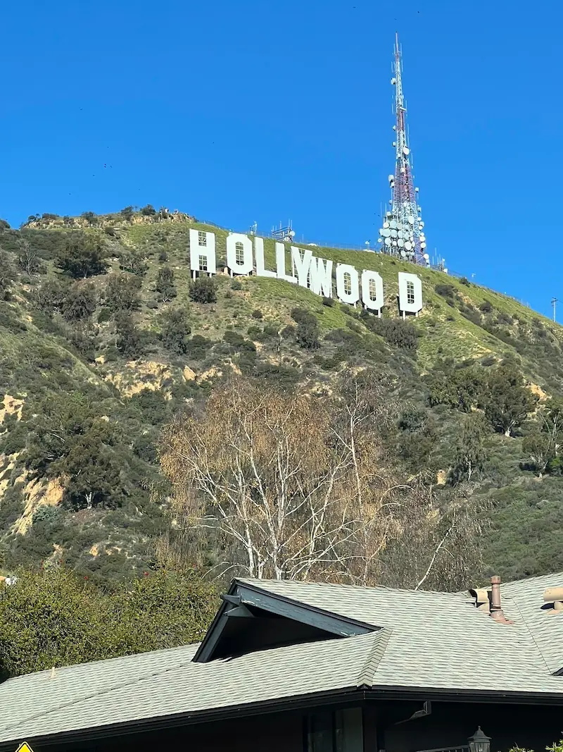 The iconic Hollywood sign in Los Angeles, representing our local roots and our specialized service for the Hollywood film and TV production industry.