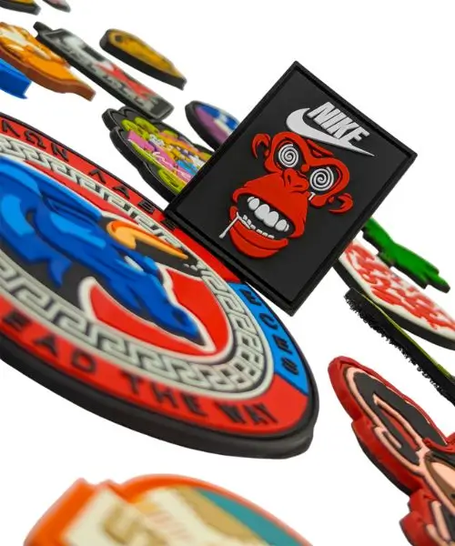 A collection of vibrant custom 3D PVC rubber patches featuring high-detail molded designs, showcasing the durable texture and layered colors of our Los Angeles manufactured gear.