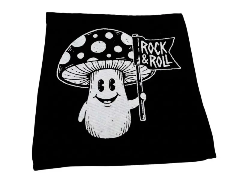 Bold black and white custom printed patch with a mushroom character design for an LA streetwear brand.