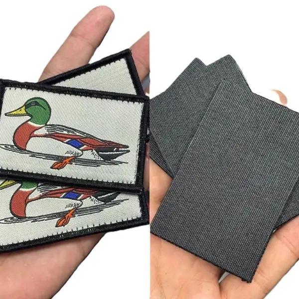 Front and back view of woven patches featuring a duck design, showcasing the durable hook-and-loop (Velcro) backing system for easy attachment.